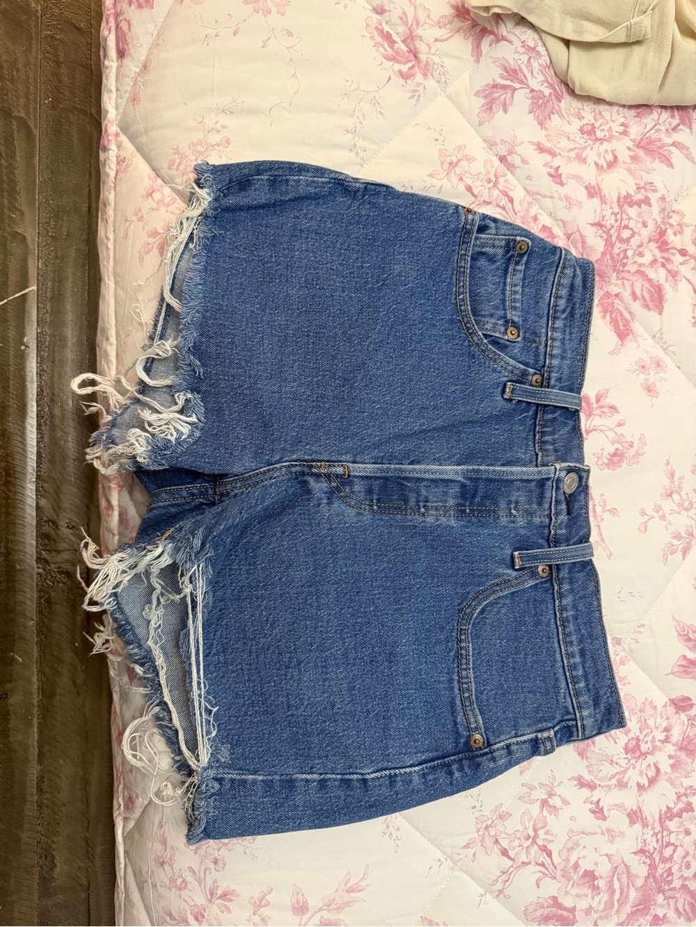 Levi's Medium Blue Distressed Denim Cutoff Shorts